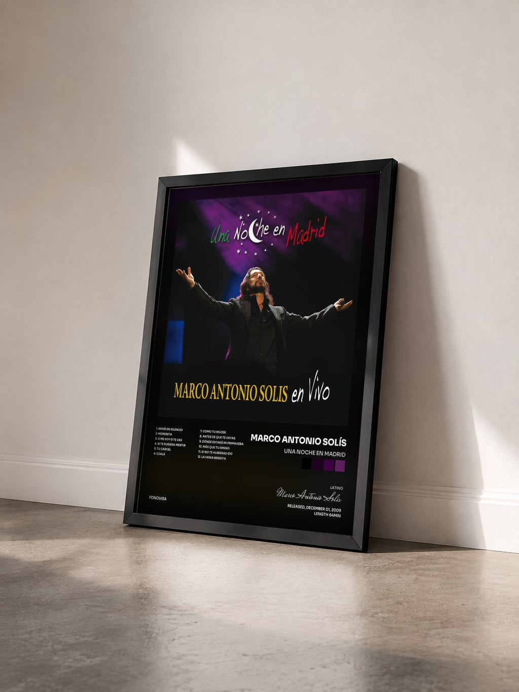 #noir Tableau de l'album Una Noche En Madrid de Marco Antonio Solís vu de trois quarts, cadre noir