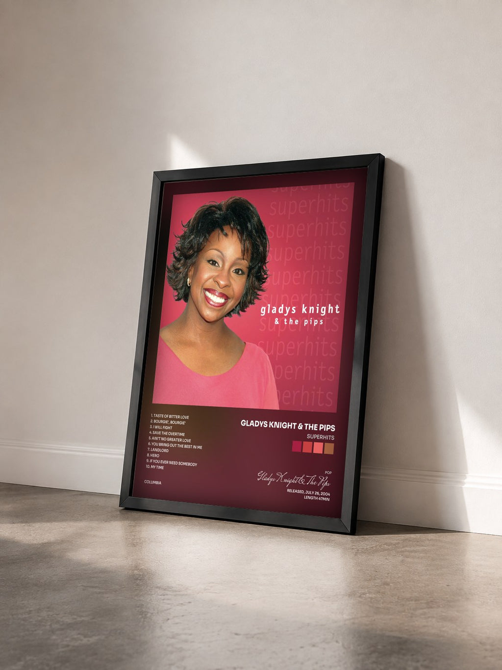 #noir Tableau de l'album Superhits de Gladys Knight & The Pips vu de trois quarts, cadre noir