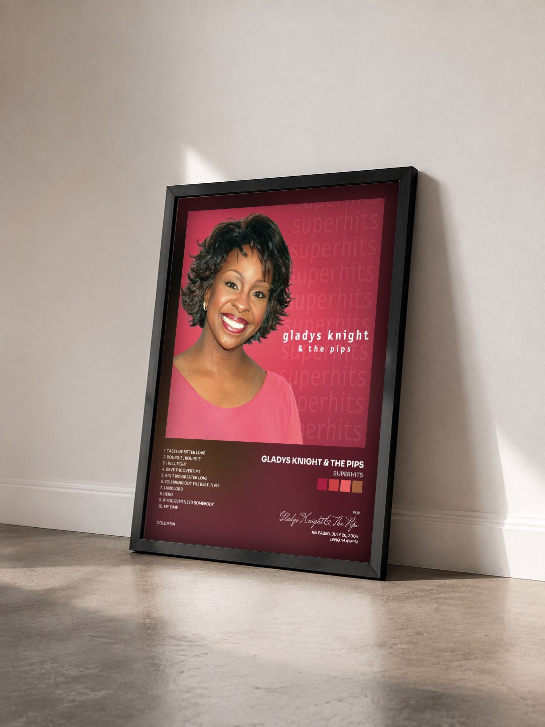 #noir Tableau de l'album Superhits de Gladys Knight & The Pips vu de trois quarts, cadre noir