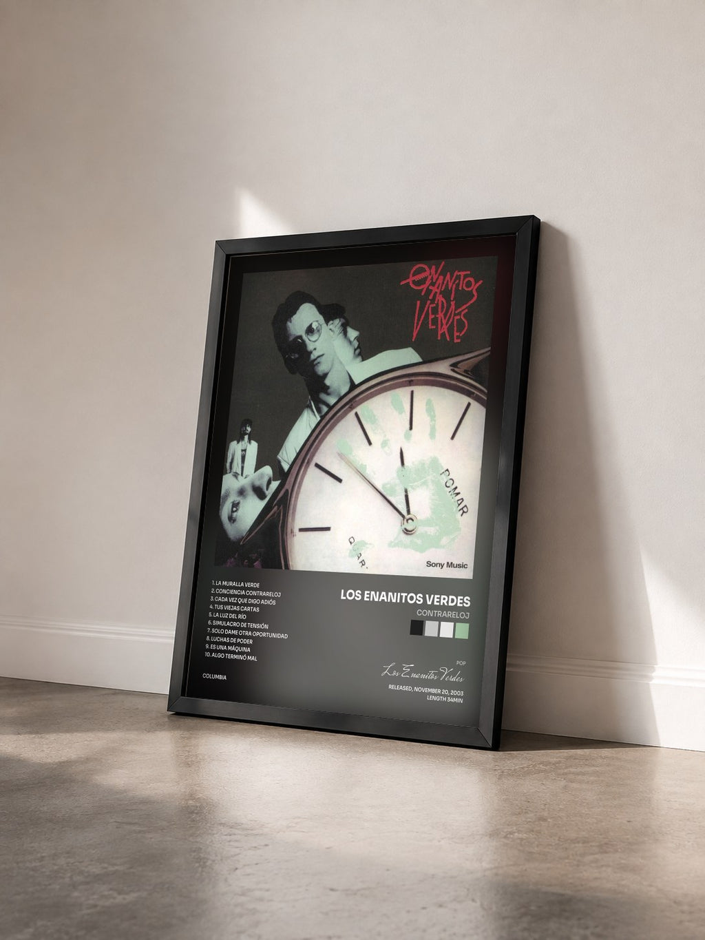 #noir Tableau de l'album Contrareloj de Los Enanitos Verdes vu de trois quarts, cadre noir