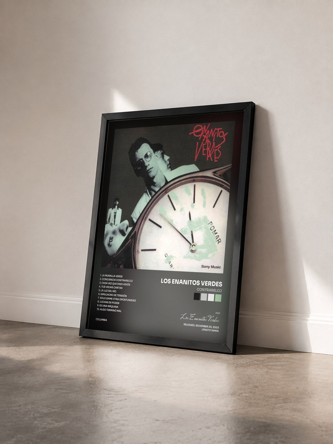 #noir Tableau de l'album Contrareloj de Los Enanitos Verdes vu de trois quarts, cadre noir