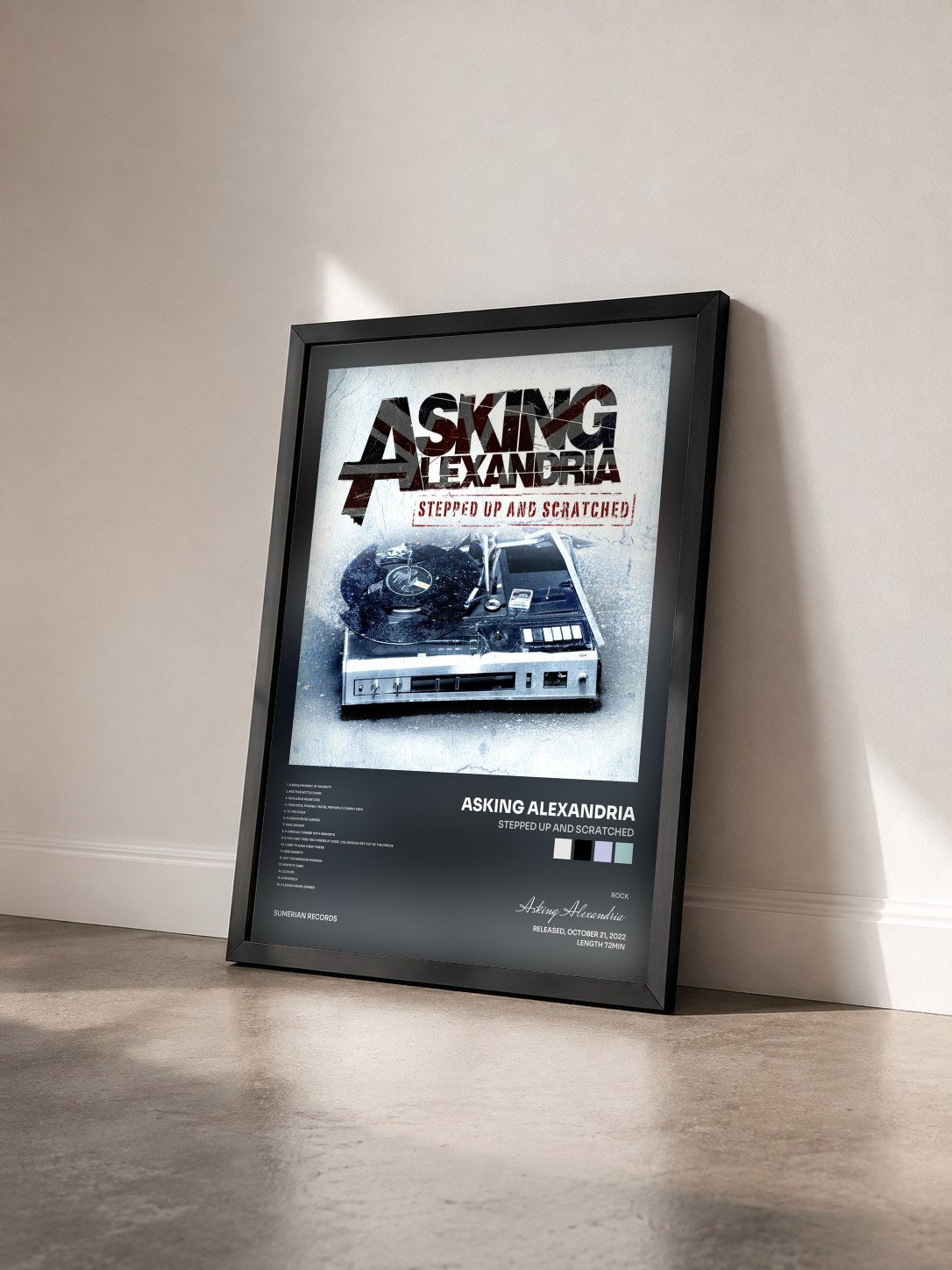 #noir Tableau de l'album Stepped Up And Scratched de Asking Alexandria vu de trois quarts, cadre noir