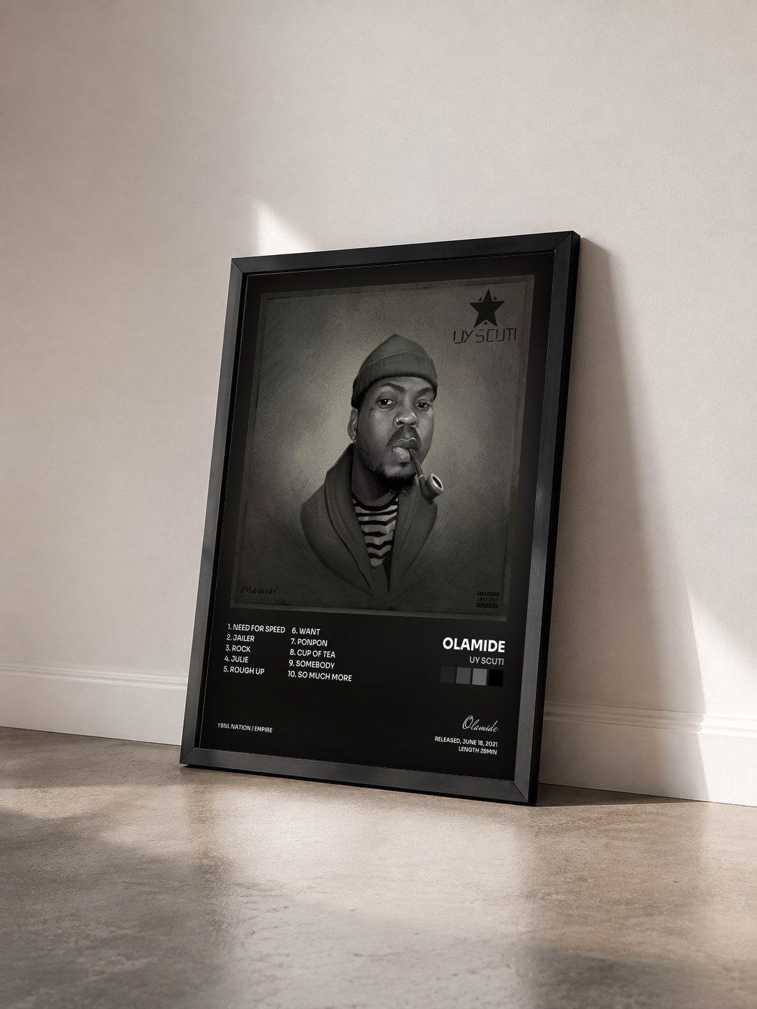 #noir Tableau de l'album UY Scuti de Olamide vu de trois quarts, cadre noir