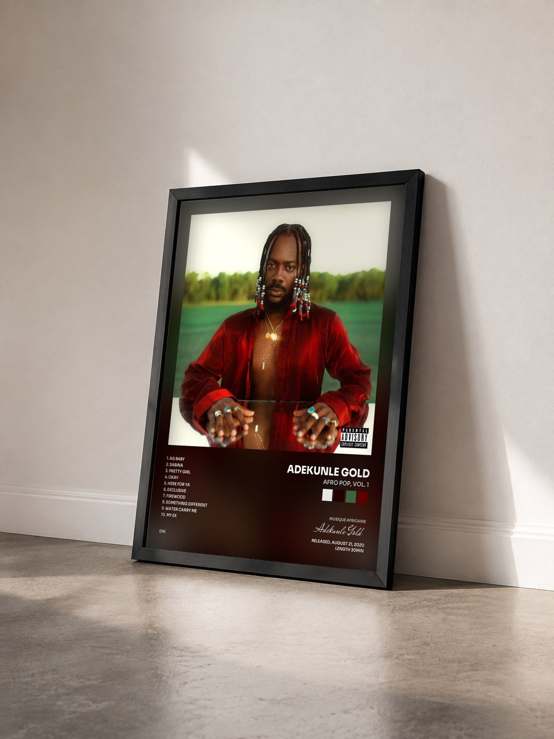 #noir Tableau de l'album Afro Pop, Vol. 1 de Adekunle Gold vu de trois quarts, cadre noir