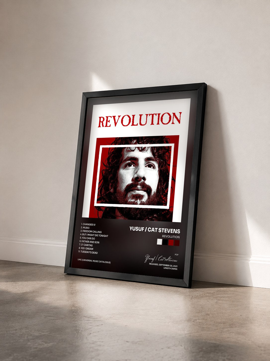 #noir Tableau de l'album REVOLUTION de Yusuf / Cat Stevens vu de trois quarts, cadre noir
