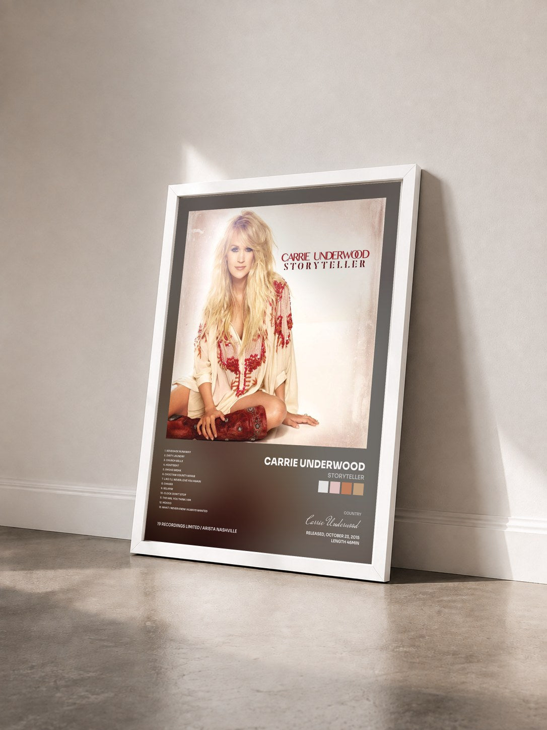 #blanc Tableau de l'album Storyteller de Carrie Underwood vu de trois quarts, cadre blanc