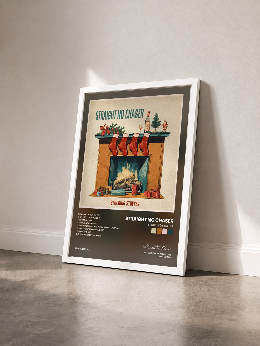 #blanc Tableau de l'album Stocking Stuffer de Straight No Chaser vu de trois quarts, cadre blanc
