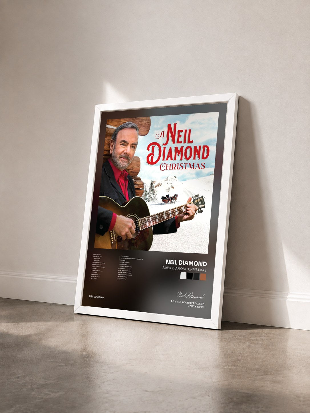 #blanc A Neil Diamond Christmas von Neil Diamond als gerahmter Kunstdruck von schräg gesehen, weißer Rahmen