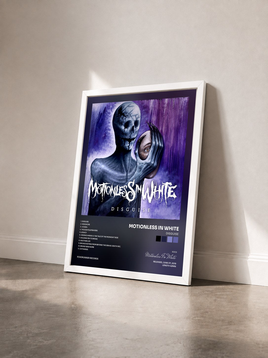 #blanc Tableau de l'album Disguise de Motionless In White vu de trois quarts, cadre blanc