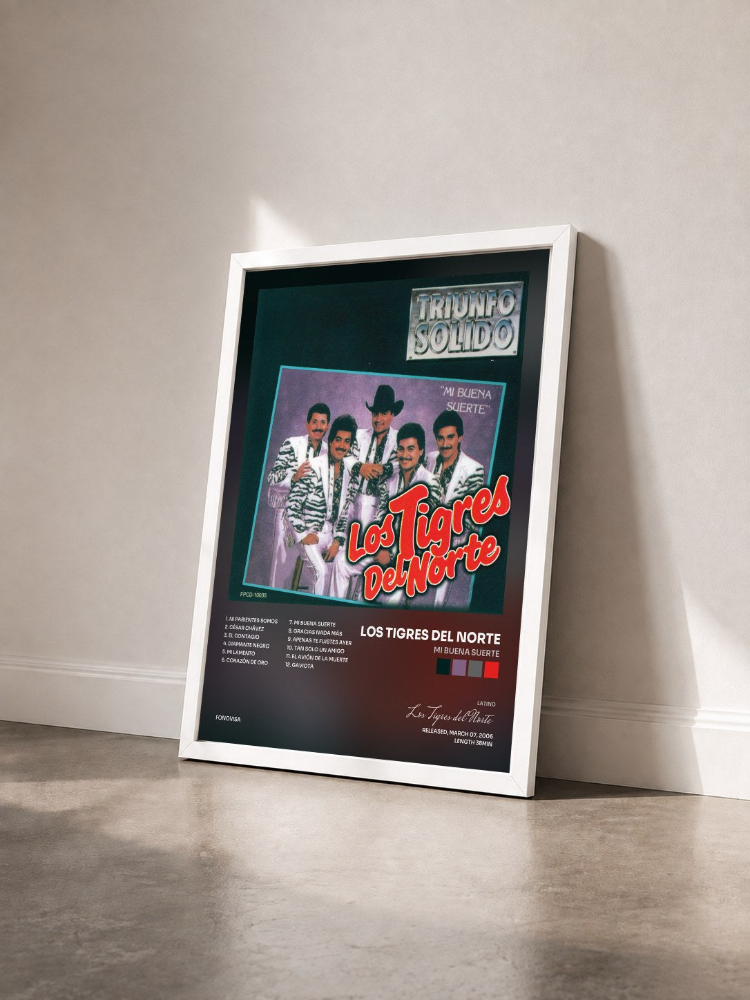 #blanc Tableau de l'album Mi Buena Suerte de Los Tigres del Norte vu de trois quarts, cadre blanc