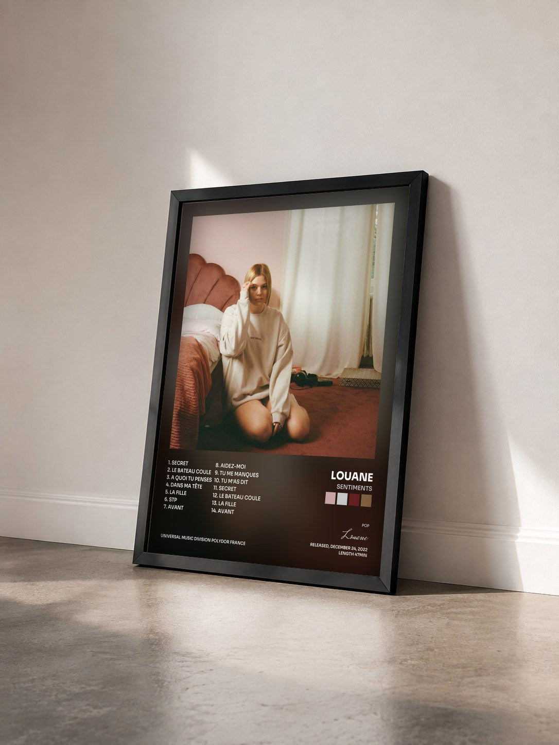 #noir Tableau de l'album Sentiments de Louane vu de trois quarts, cadre noir