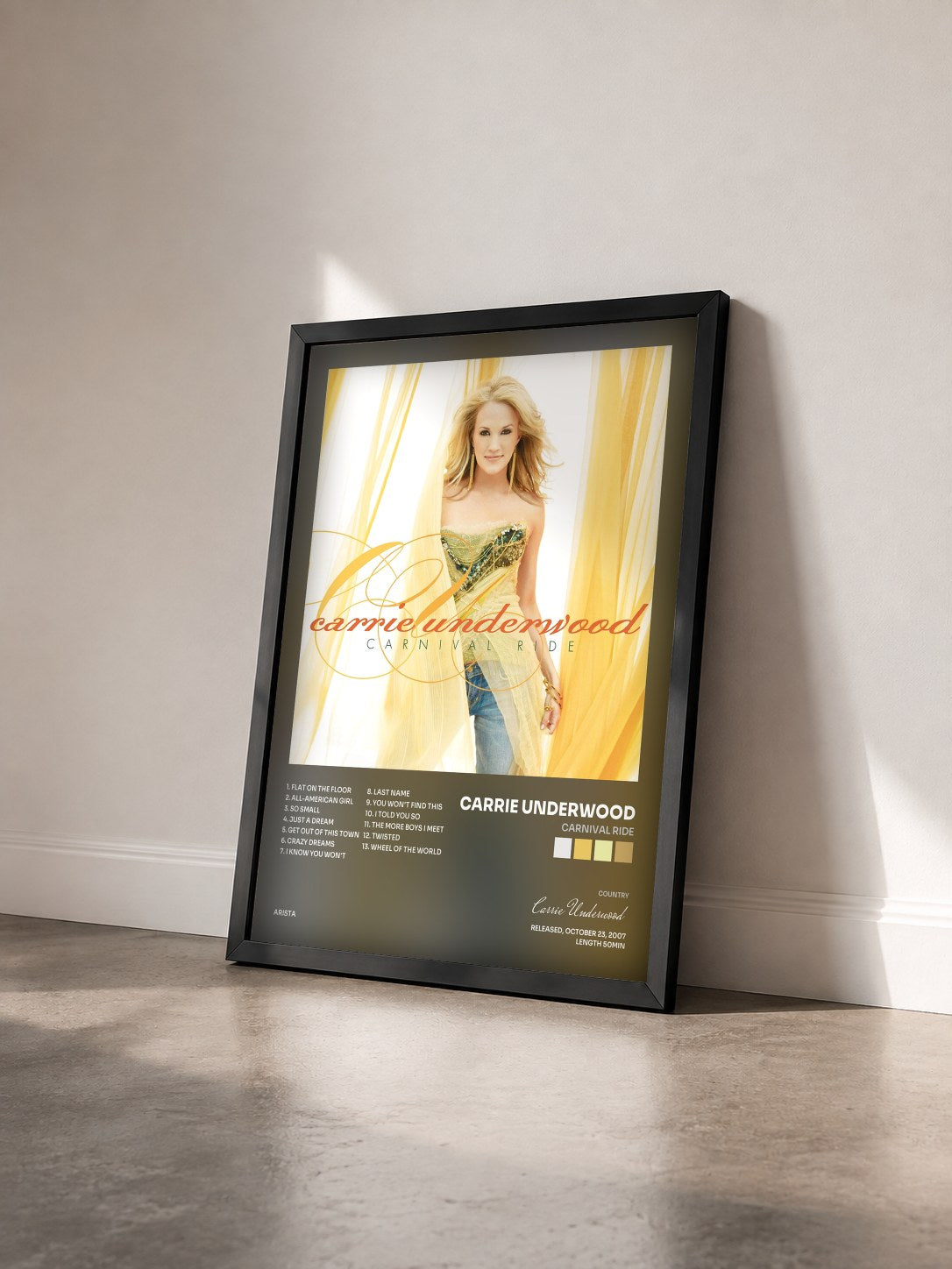 #noir Tableau de l'album Carnival Ride de Carrie Underwood vu de trois quarts, cadre noir