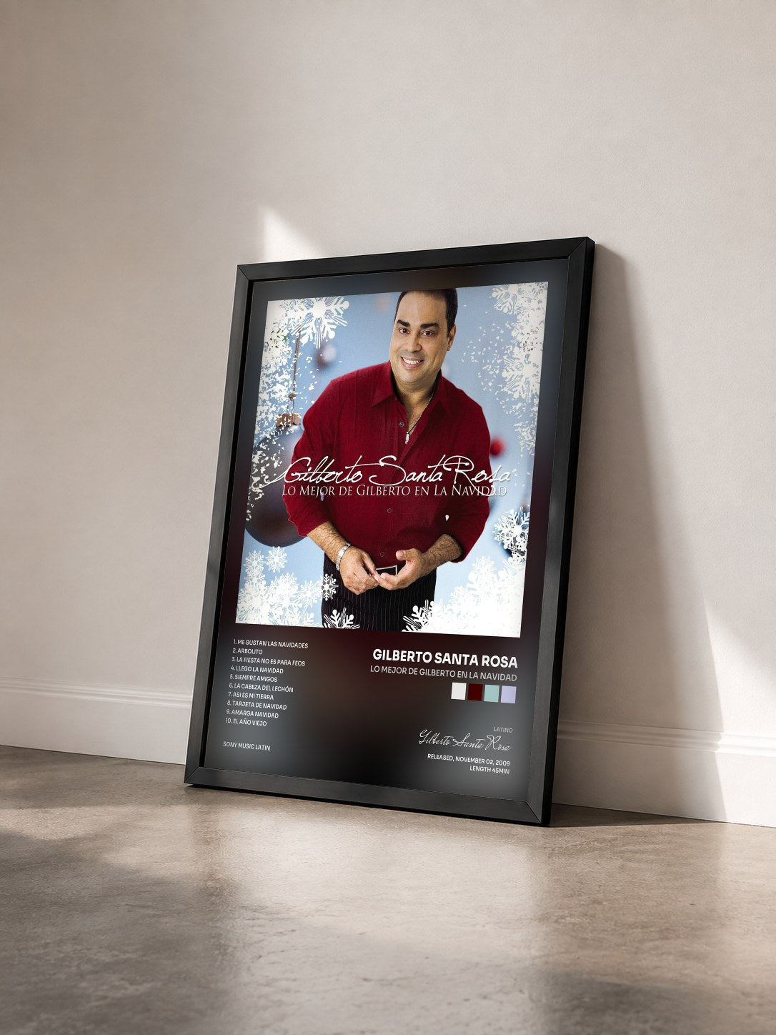 #noir Tableau de l'album Lo Mejor De Gilberto En La Navidad de Gilberto Santa Rosa vu de trois quarts, cadre noir