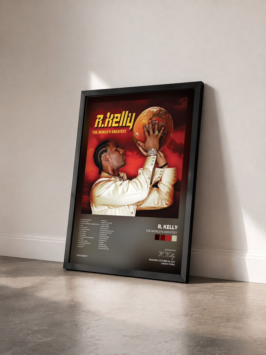 #noir Tableau de l'album The World's Greatest de R. Kelly vu de trois quarts, cadre noir