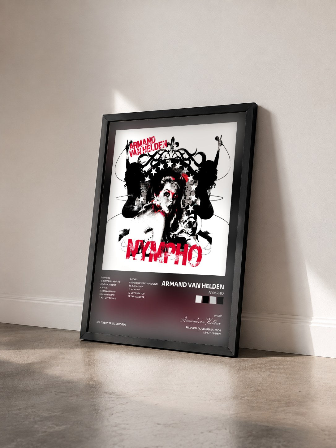 #noir Tableau de l'album Nympho de Armand van Helden vu de trois quarts, cadre noir