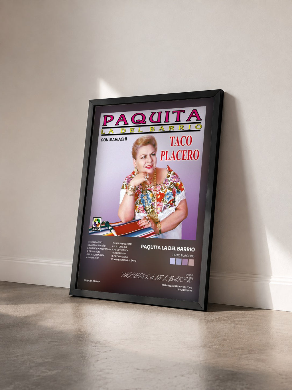 #noir Tableau de l'album Taco Placero de PAQUITA LA DEL BARRIO vu de trois quarts, cadre noir