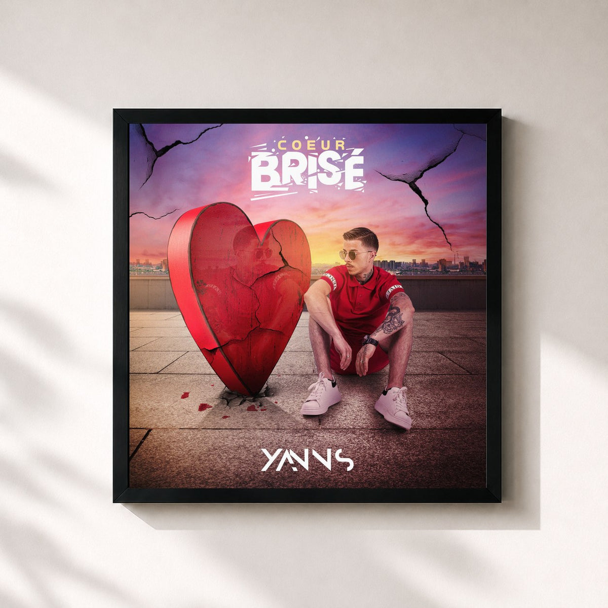 #noir Tableau carré de l'album Coeur brisé de Yanns, cadre noir 32x32 cm