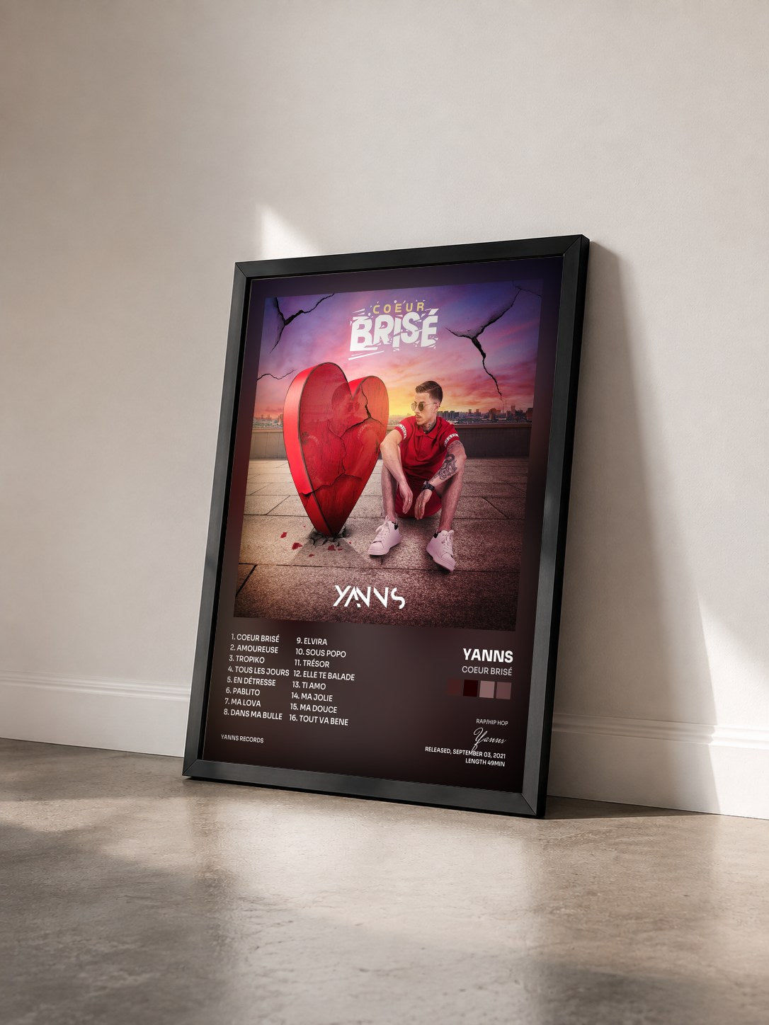 #noir Tableau de l'album Coeur brisé de Yanns vu de trois quarts, cadre noir