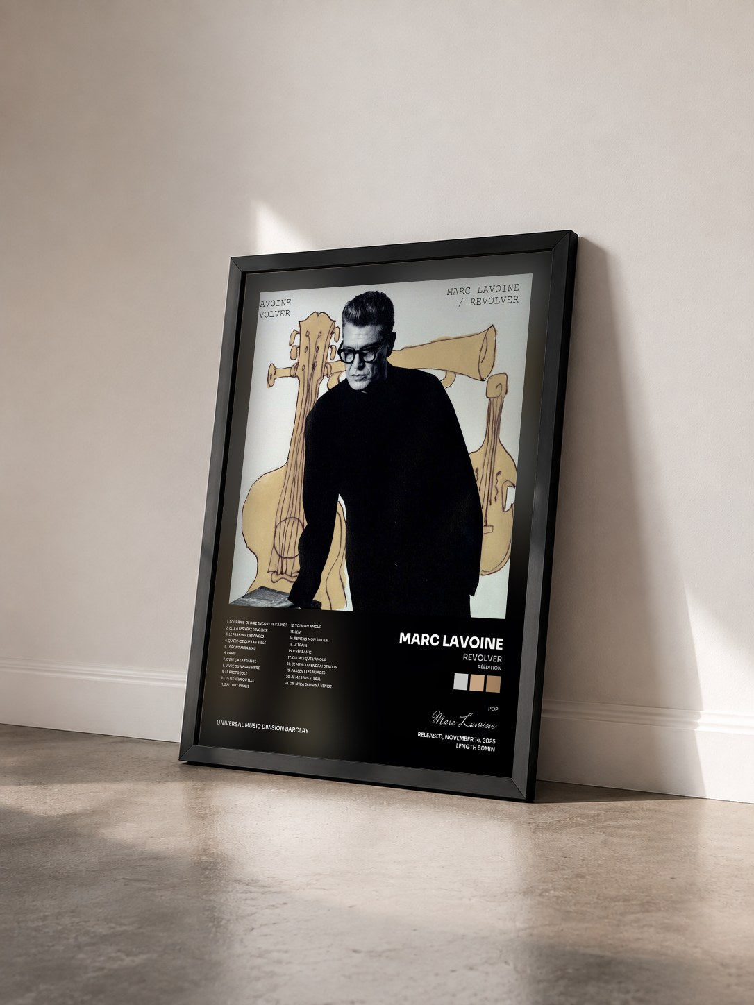 #noir Tableau de l'album Revolver (Réédition) de Marc Lavoine vu de trois quarts, cadre noir