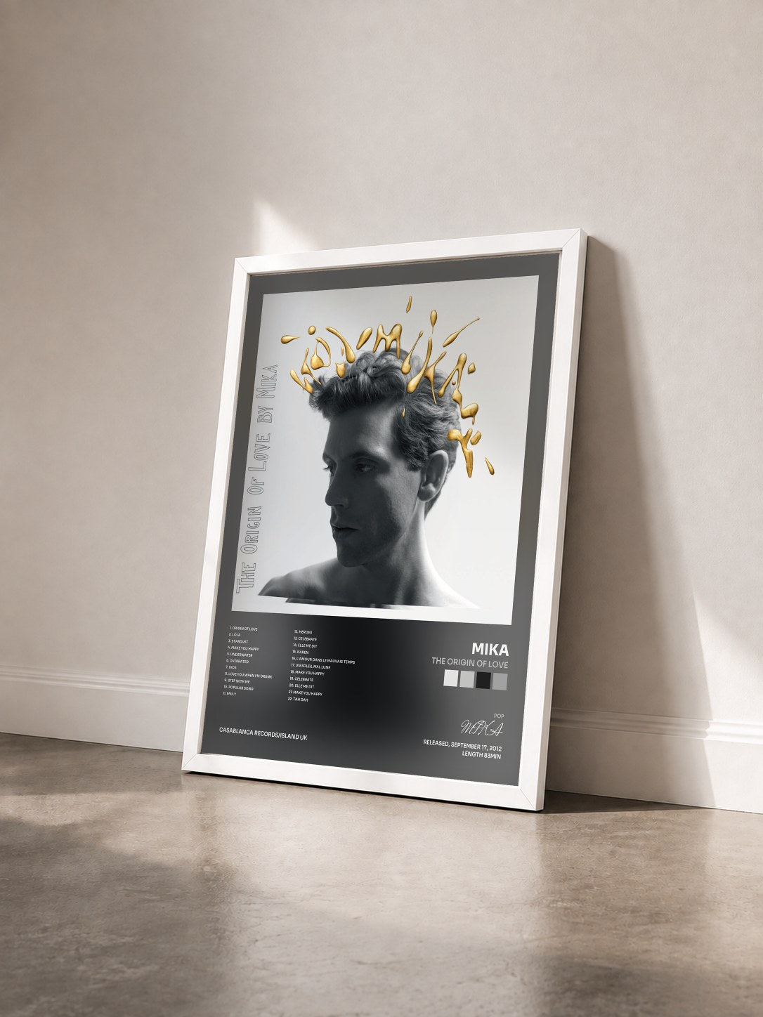 #blanc The Origin Of Love by MIKA as a framed art print seen at an angle, white frame