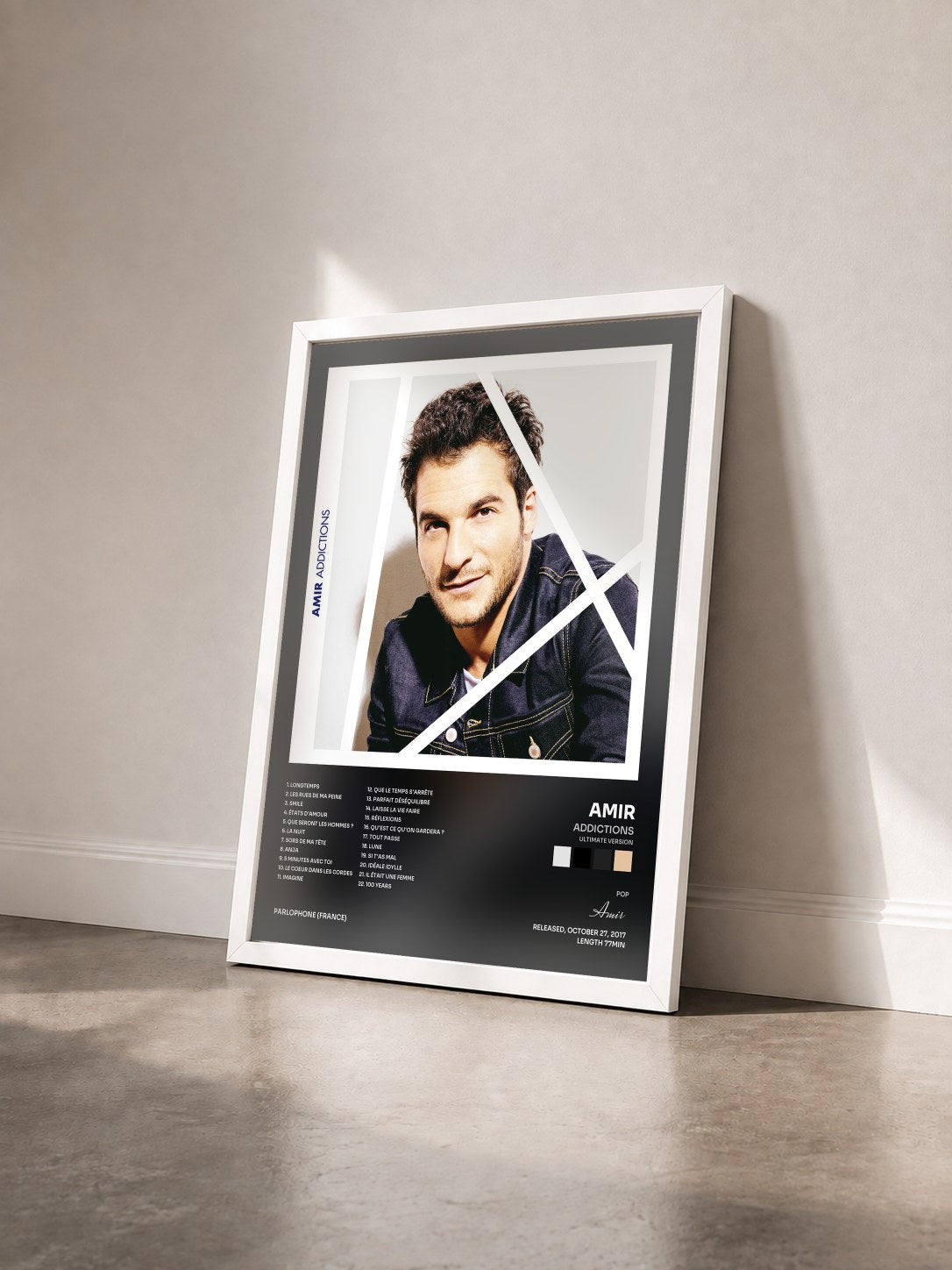 #blanc Tableau de l'album Addictions (Ultimate Version) de Amir vu de trois quarts, cadre blanc