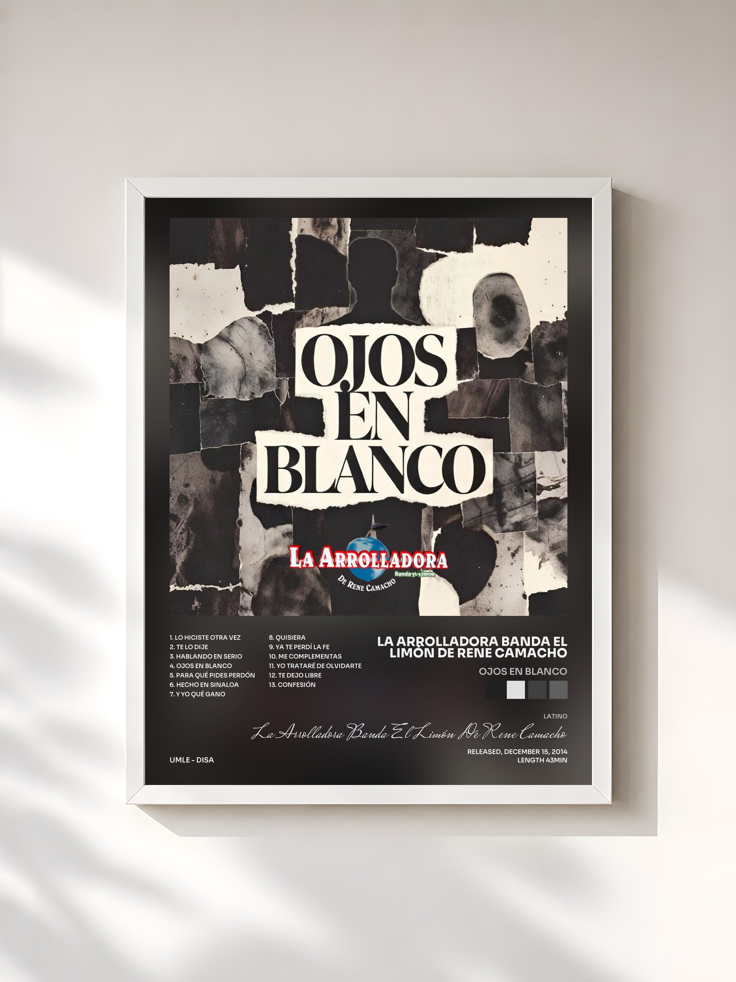 #blanc Tableau de l'album Ojos En Blanco de La Arrolladora Banda El Limón De Rene Camacho, cadre blanc, imprimé et encadré en France