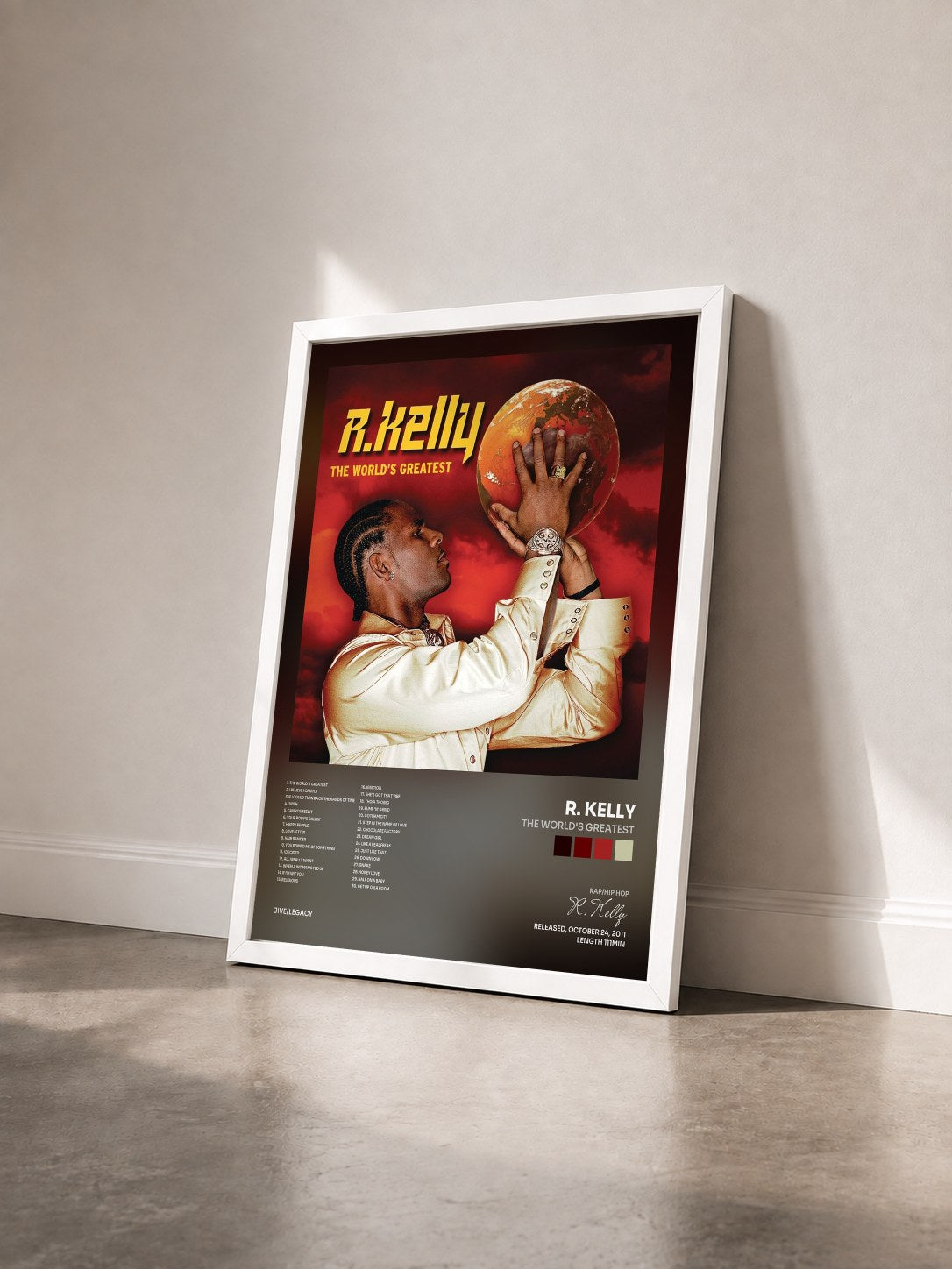 #blanc Tableau de l'album The World's Greatest de R. Kelly vu de trois quarts, cadre blanc