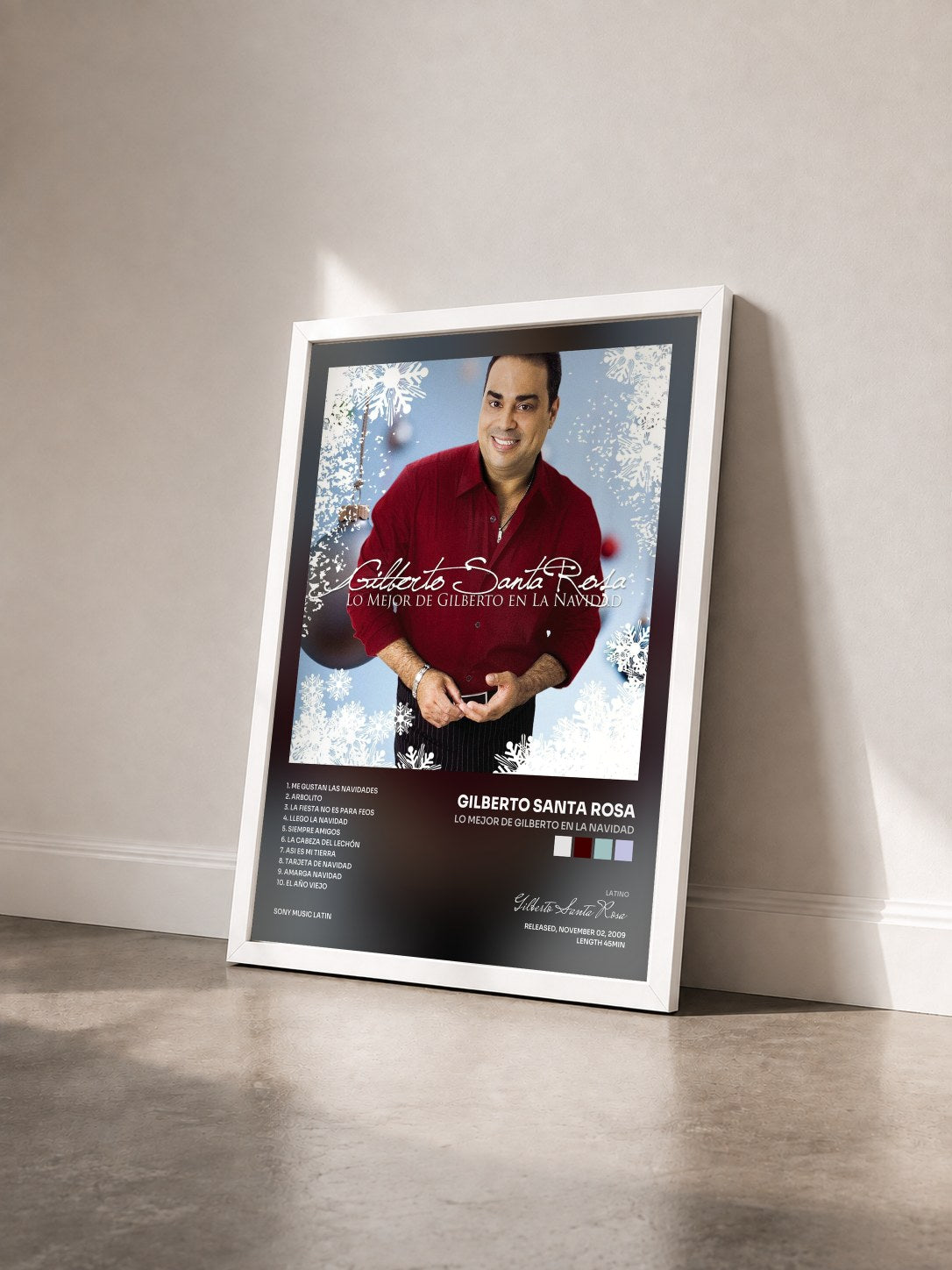 #blanc Tableau de l'album Lo Mejor De Gilberto En La Navidad de Gilberto Santa Rosa vu de trois quarts, cadre blanc