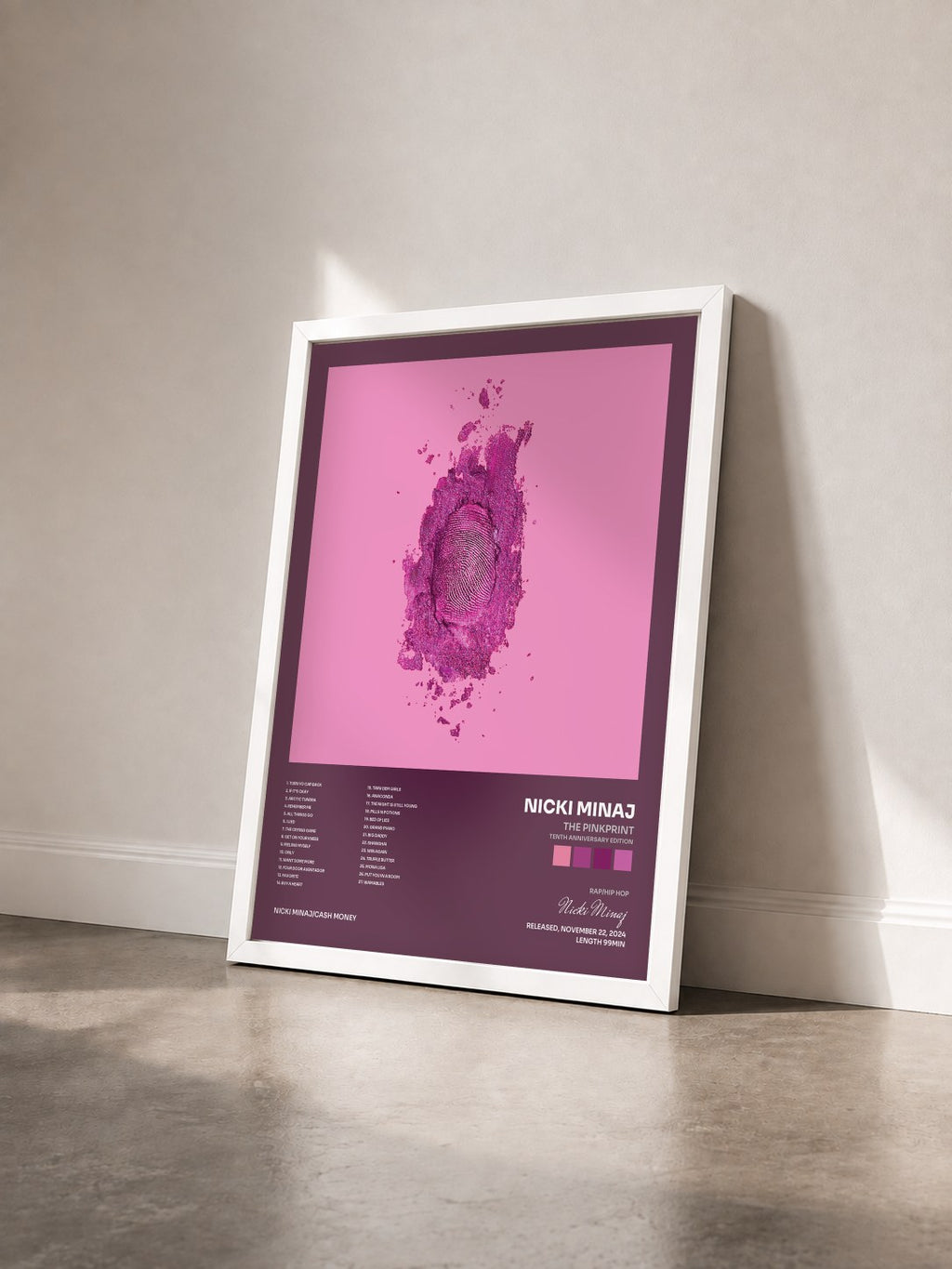 #blanc Tableau de l'album The Pinkprint (Tenth Anniversary Edition) de Nicki Minaj vu de trois quarts, cadre blanc