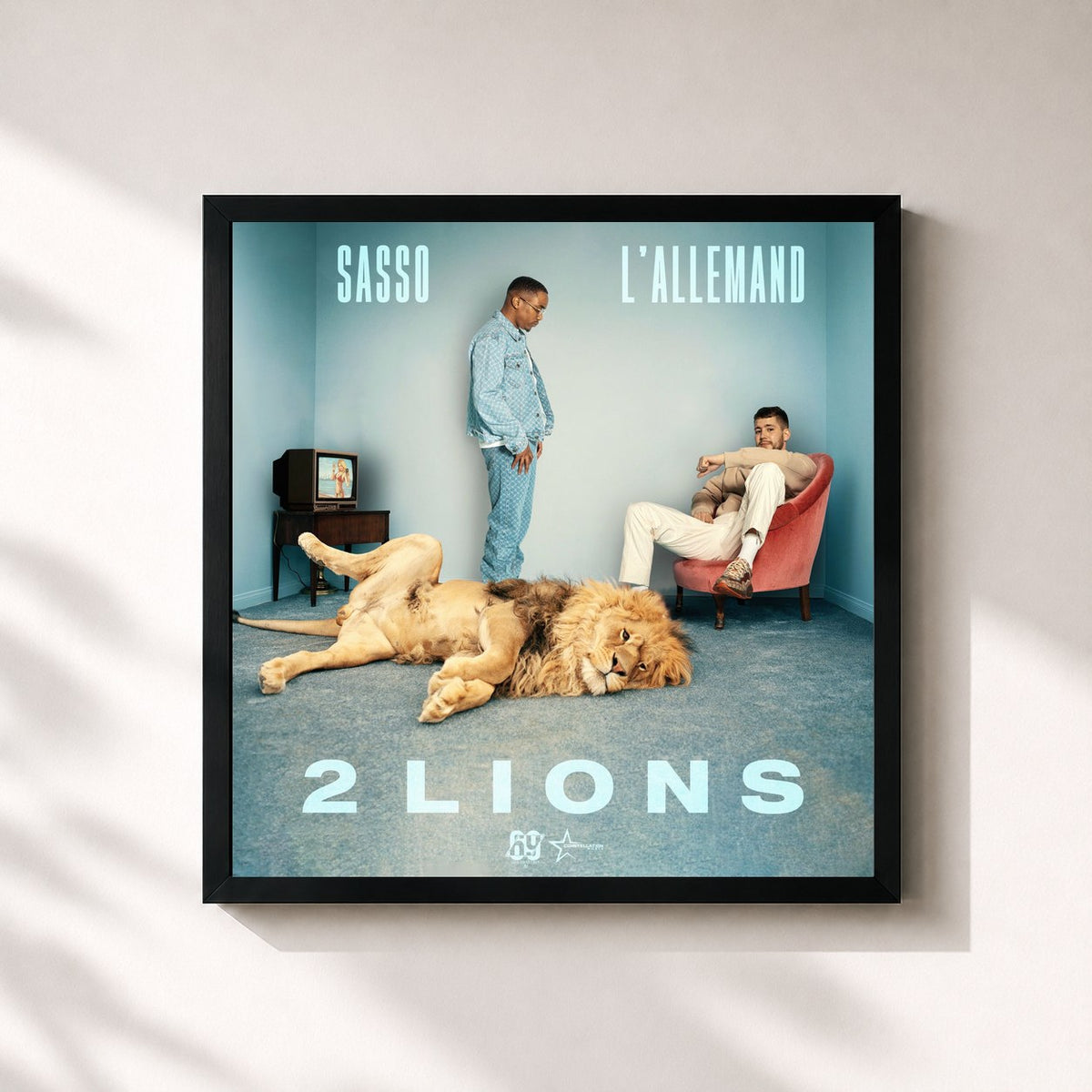 #noir Tableau carré de l'album 2 Lions de Sasso, cadre noir 32x32 cm