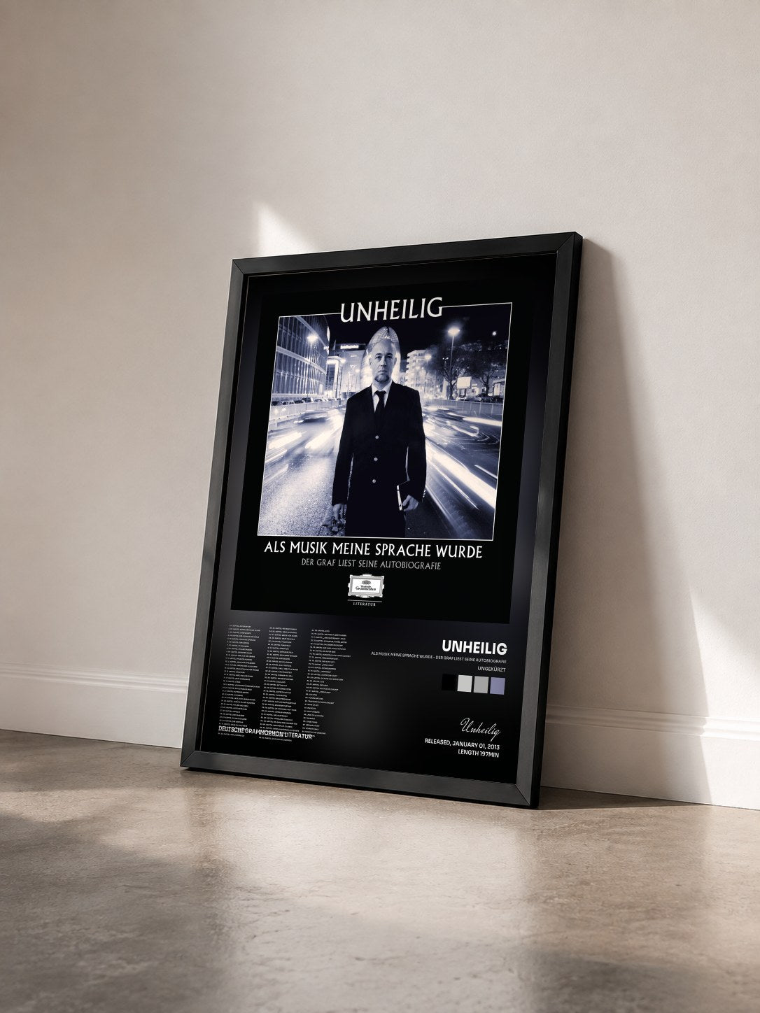 #noir Tableau de l'album Als Musik meine Sprache wurde - Der Graf liest seine Autobiografie (Ungekürzt) de Unheilig vu de trois quarts, cadre noir