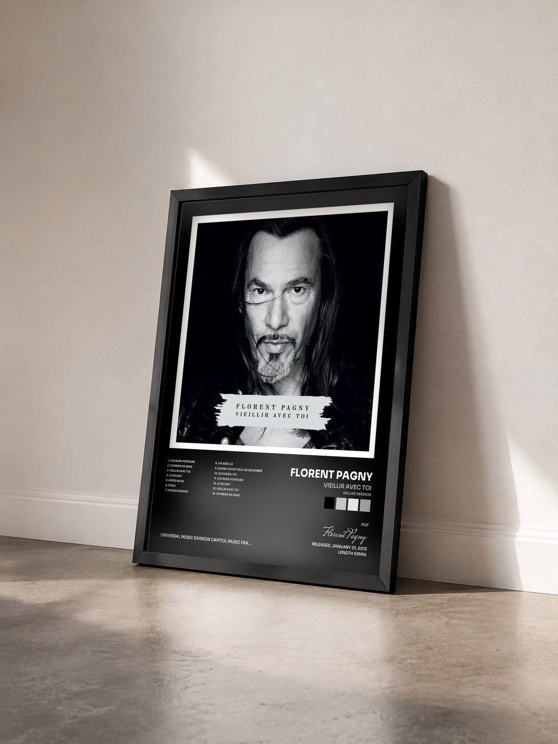 #noir Tableau de l'album Vieillir Avec Toi (Deluxe Version) de Florent Pagny vu de trois quarts, cadre noir