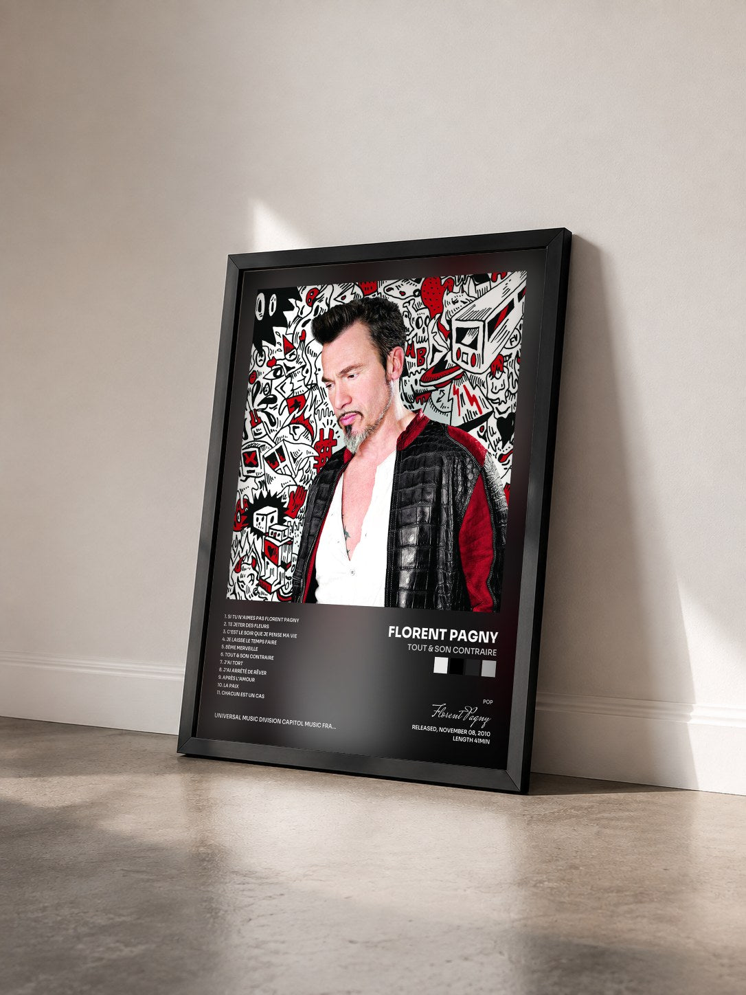#noir Tableau de l'album Tout & Son Contraire de Florent Pagny vu de trois quarts, cadre noir