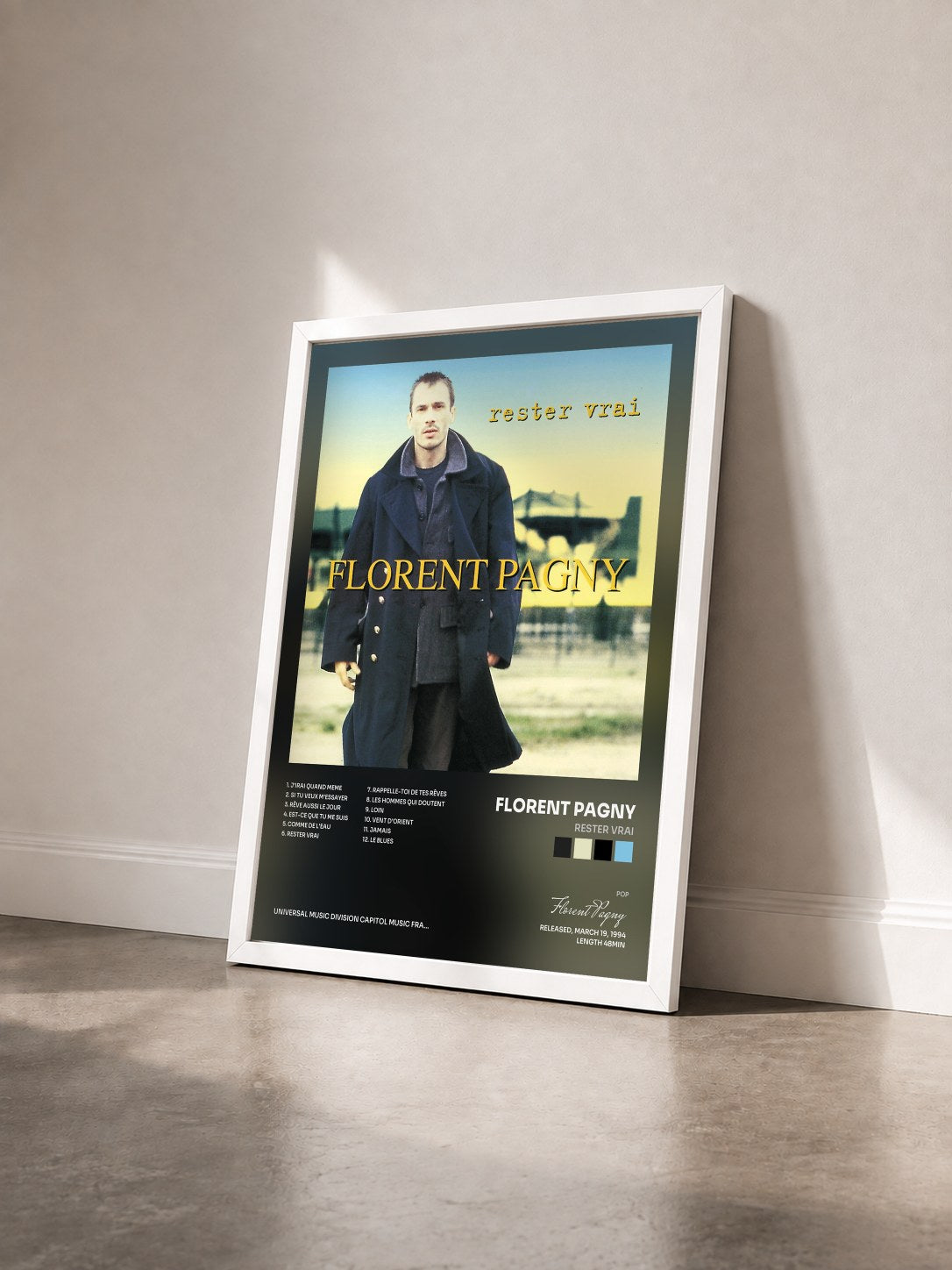 #blanc Tableau de l'album Rester Vrai de Florent Pagny vu de trois quarts, cadre blanc