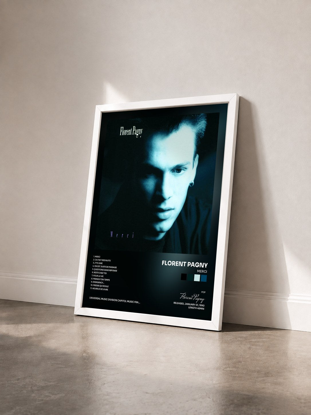 #blanc Tableau de l'album Merci de Florent Pagny vu de trois quarts, cadre blanc