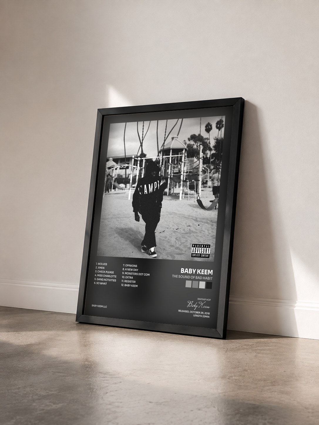 #noir Tableau de l'album The Sound of Bad Habit de Baby Keem vu de trois quarts, cadre noir