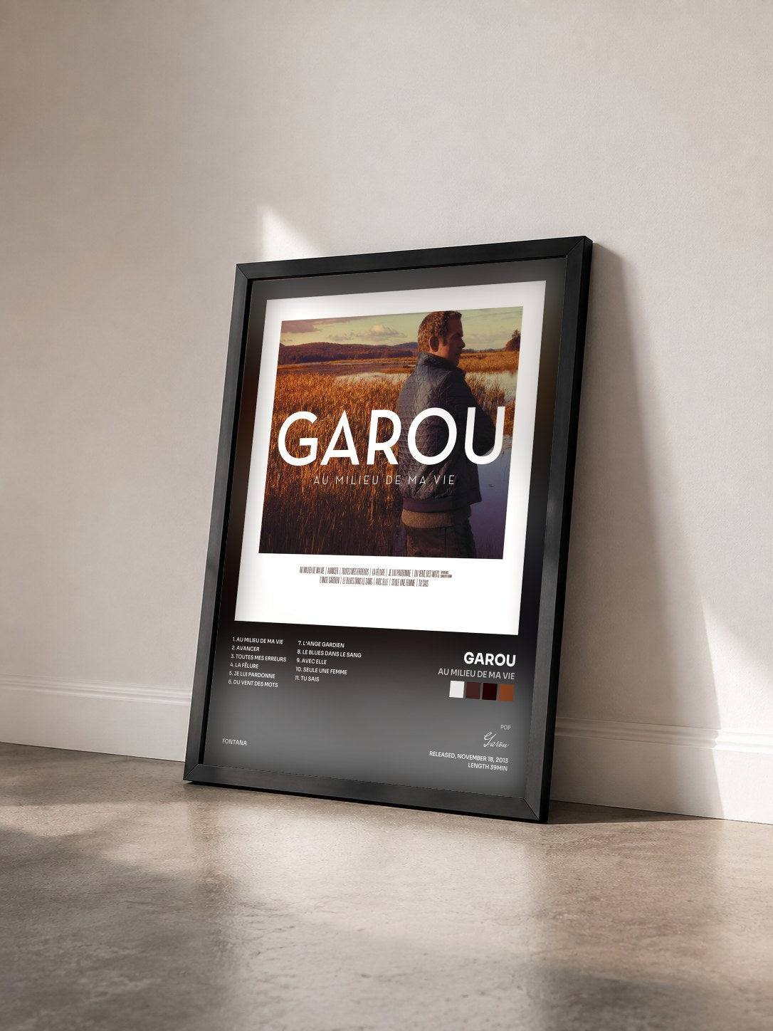 #noir Au Milieu De Ma Vie by Garou as a framed art print seen at an angle, black frame