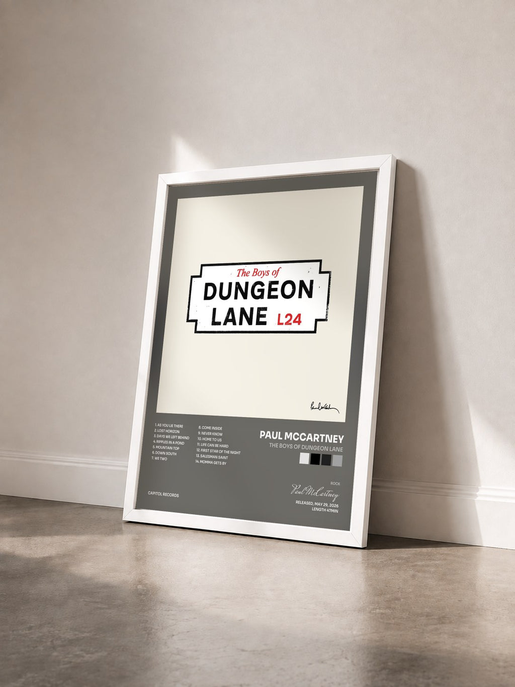 #blanc The Boys of Dungeon Lane by Paul McCartney as a framed art print seen at an angle, white frame