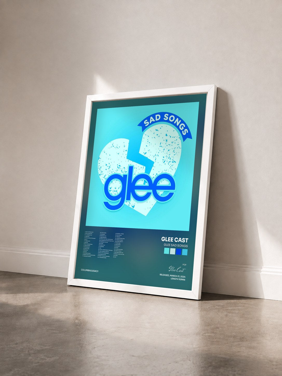 #blanc Glee Sad Songs by Glee Cast as a framed art print seen at an angle, white frame