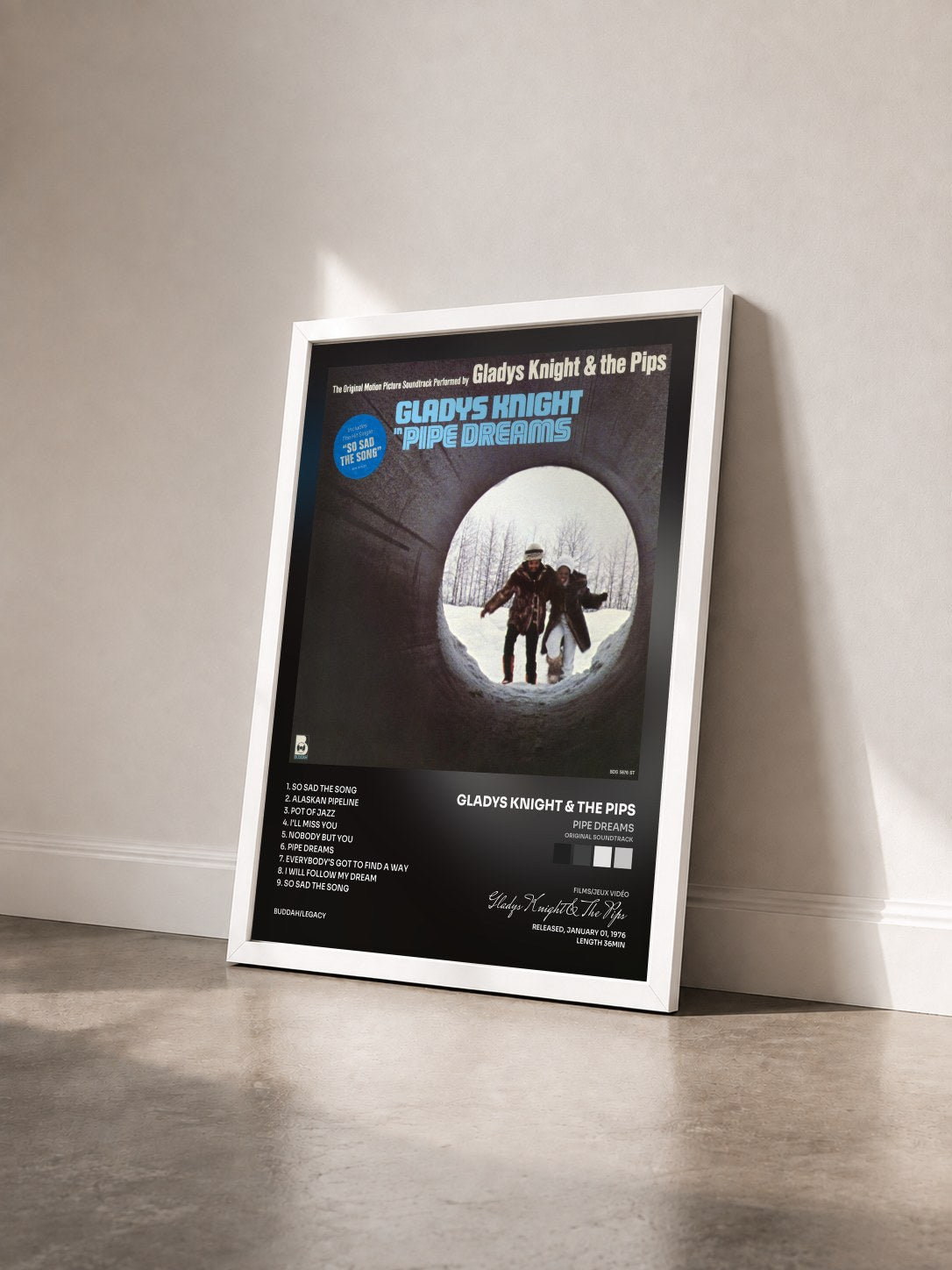 #blanc Tableau de l'album Pipe Dreams (Original Soundtrack) de Gladys Knight & The Pips vu de trois quarts, cadre blanc