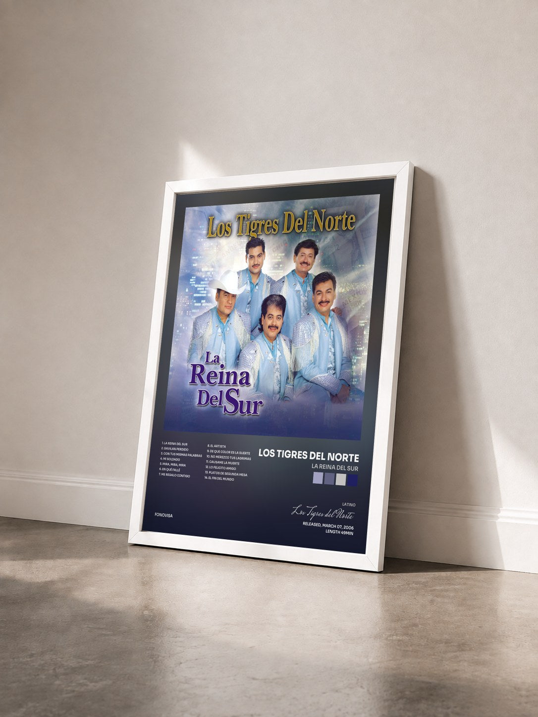 #blanc Tableau de l'album La Reina Del Sur de Los Tigres del Norte vu de trois quarts, cadre blanc