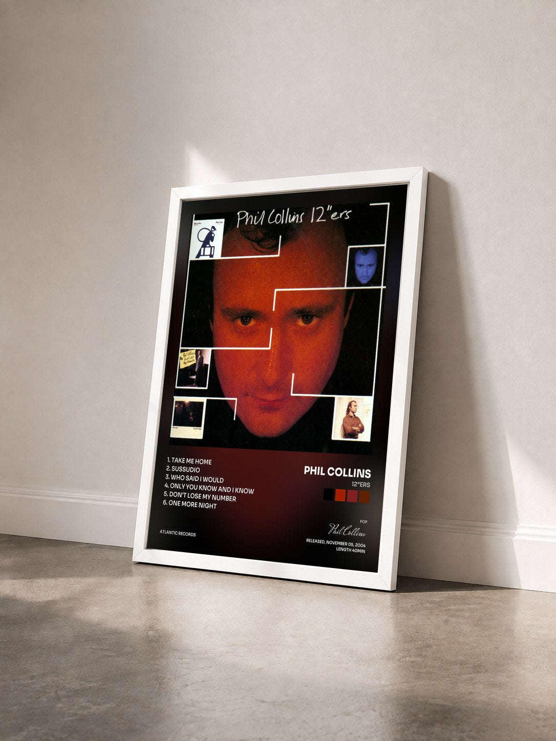 #blanc Tableau de l'album 12"ers de Phil Collins vu de trois quarts, cadre blanc