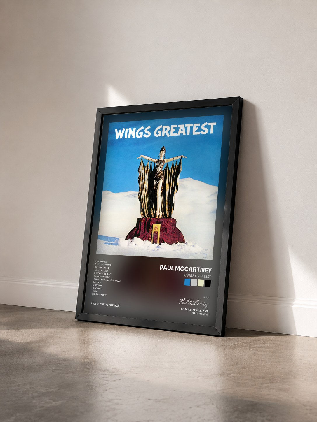 #noir Wings Greatest de Paul McCartney en lámina enmarcada vista de tres cuartos, marco negro