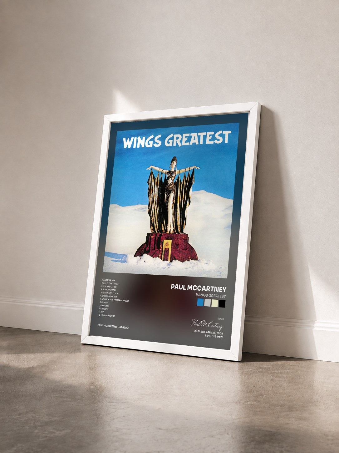 #blanc Wings Greatest de Paul McCartney en lámina enmarcada vista de tres cuartos, marco blanco