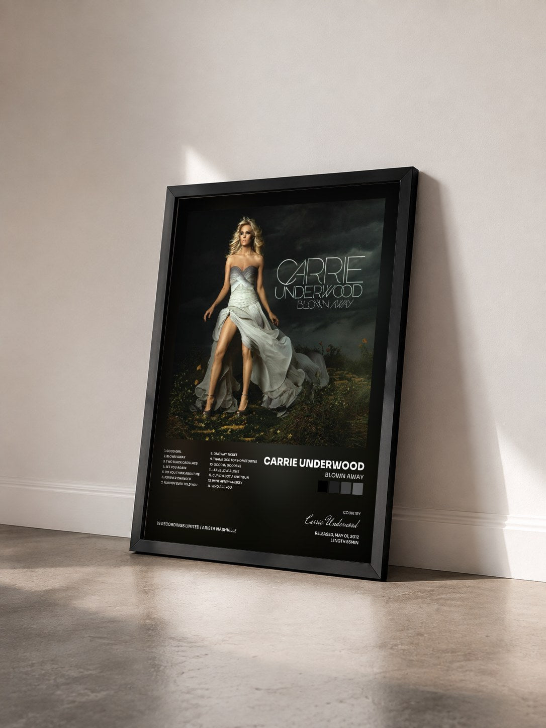 #noir Tableau de l'album Blown Away de Carrie Underwood vu de trois quarts, cadre noir