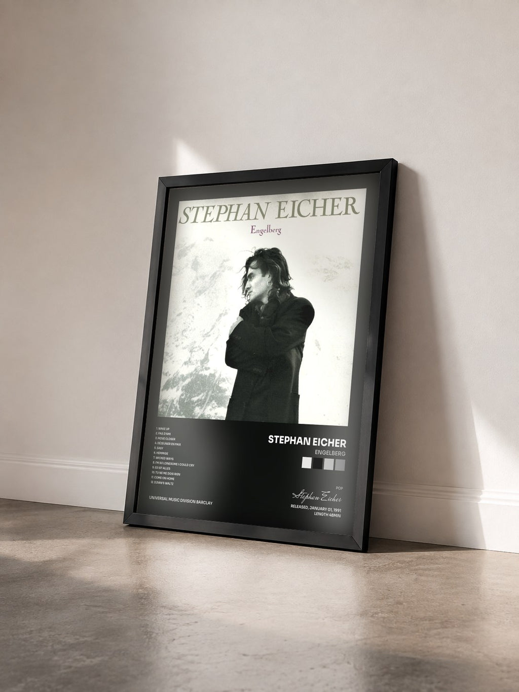 #noir Engelberg by Stephan Eicher as a framed art print seen at an angle, black frame