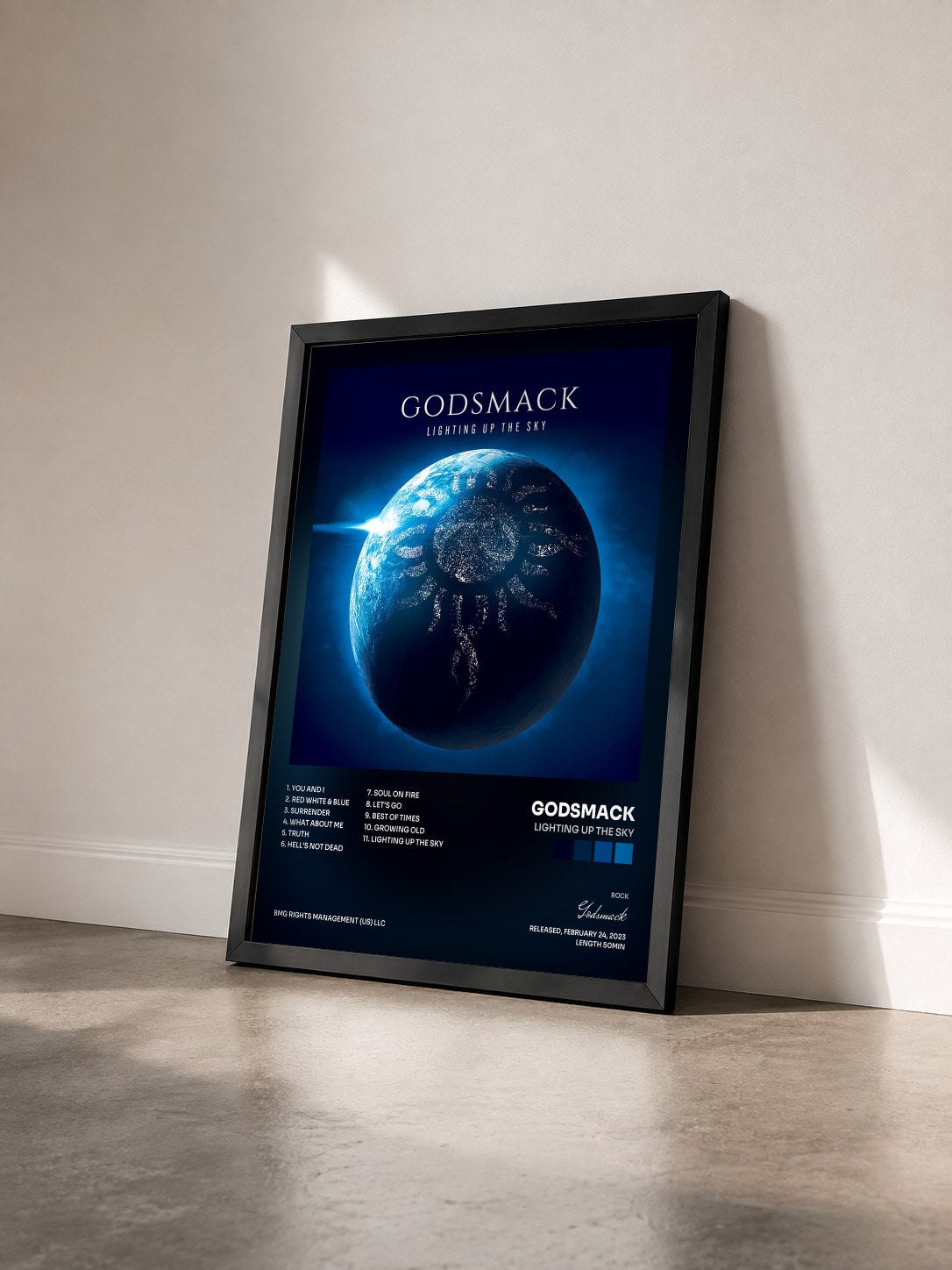#noir Tableau de l'album Lighting Up The Sky de Godsmack vu de trois quarts, cadre noir