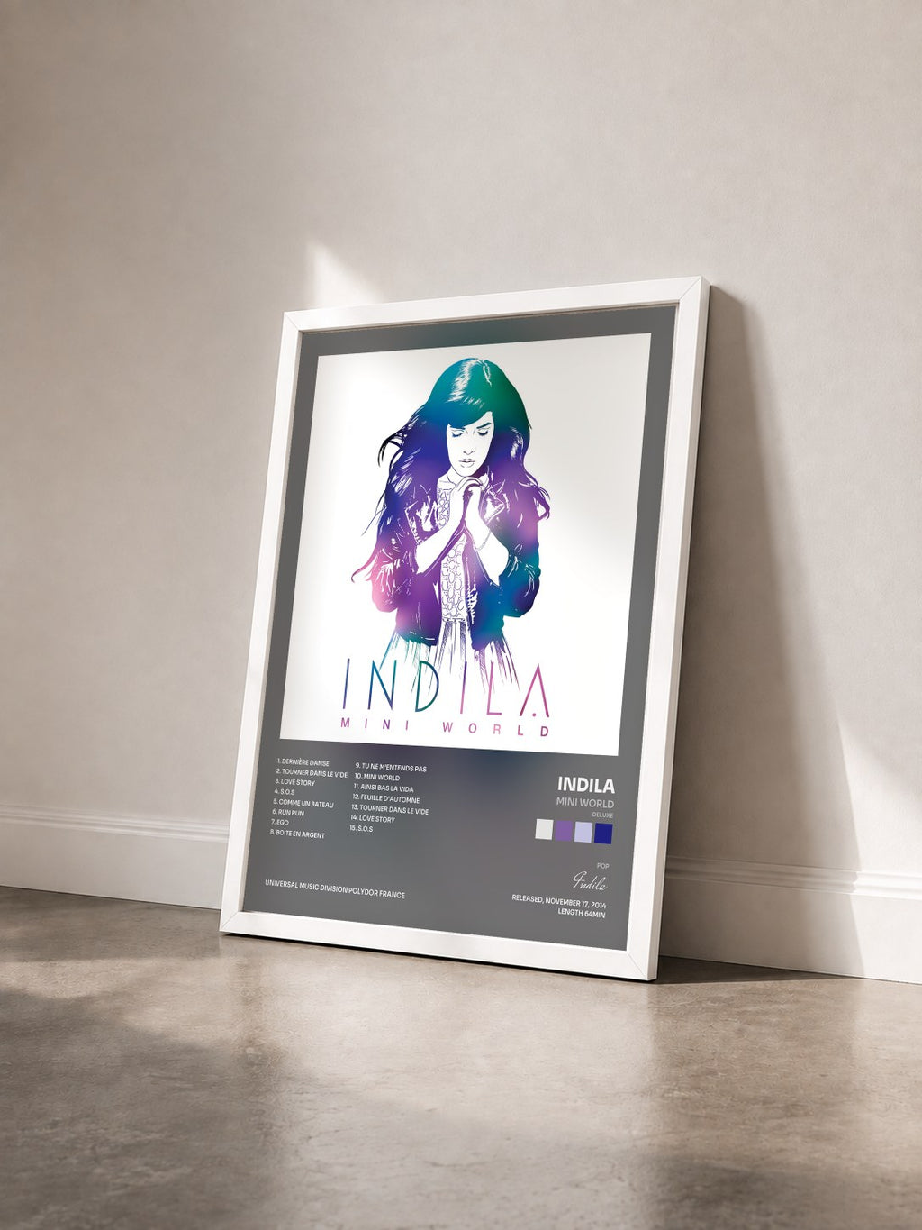 #blanc Mini World (Deluxe) de Indila en lámina enmarcada vista de tres cuartos, marco blanco