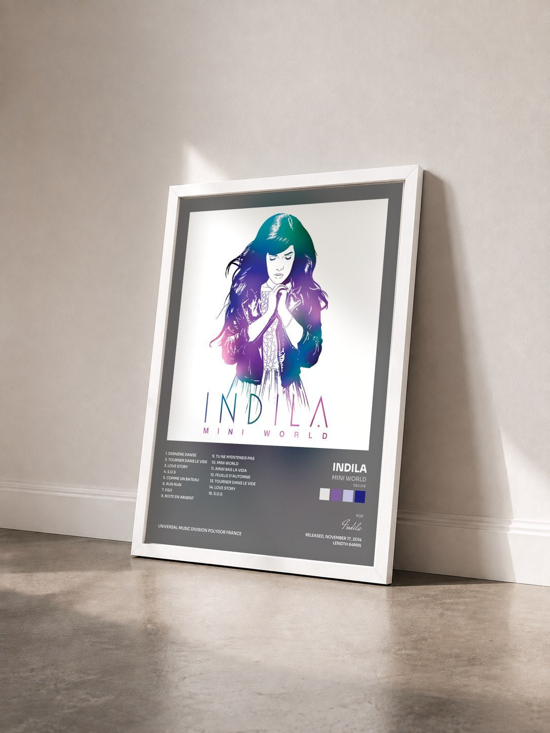 #blanc Tableau de l'album Mini World (Deluxe) de Indila vu de trois quarts, cadre blanc