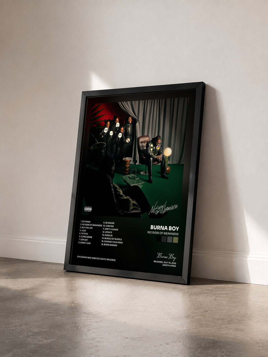 #noir Tableau de l'album No Sign of Weakness de Burna Boy vu de trois quarts, cadre noir